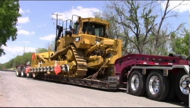 Bulldozer on a heavy equipment transport 